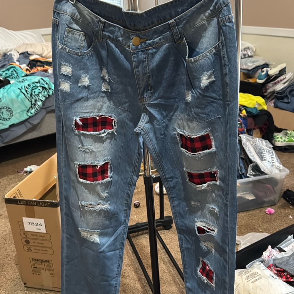 Brand new women’s size XL ripped jeans black/red checkered